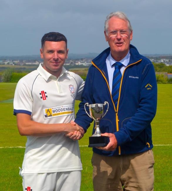 Ben Adams receives the tropy for Hundleton from Andrew Scott-Davies